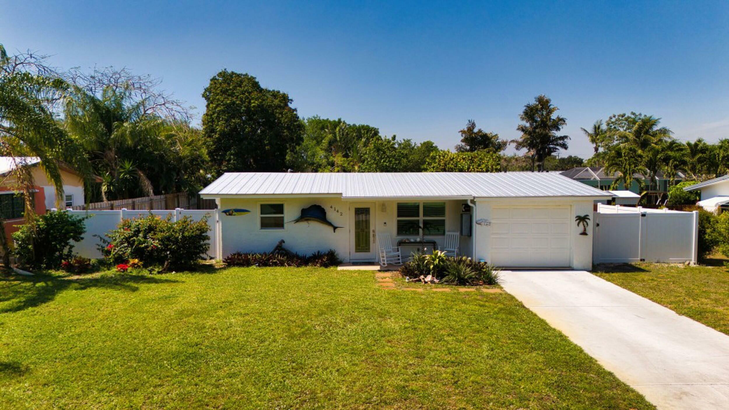 Property Photo: 4142 NE Robin Court FL 34957