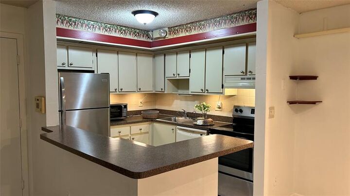 Property Photo:  9702 S Belfort Cir 112  FL 33321 