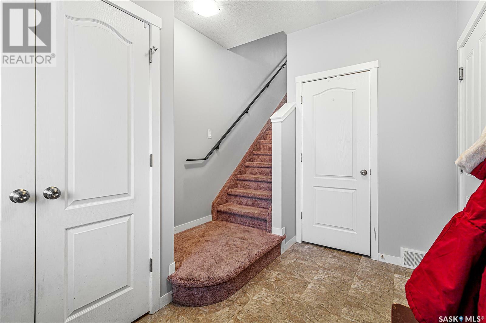 Property Photo: 303 3440 Avonhurst Drive SK S4R 2E1