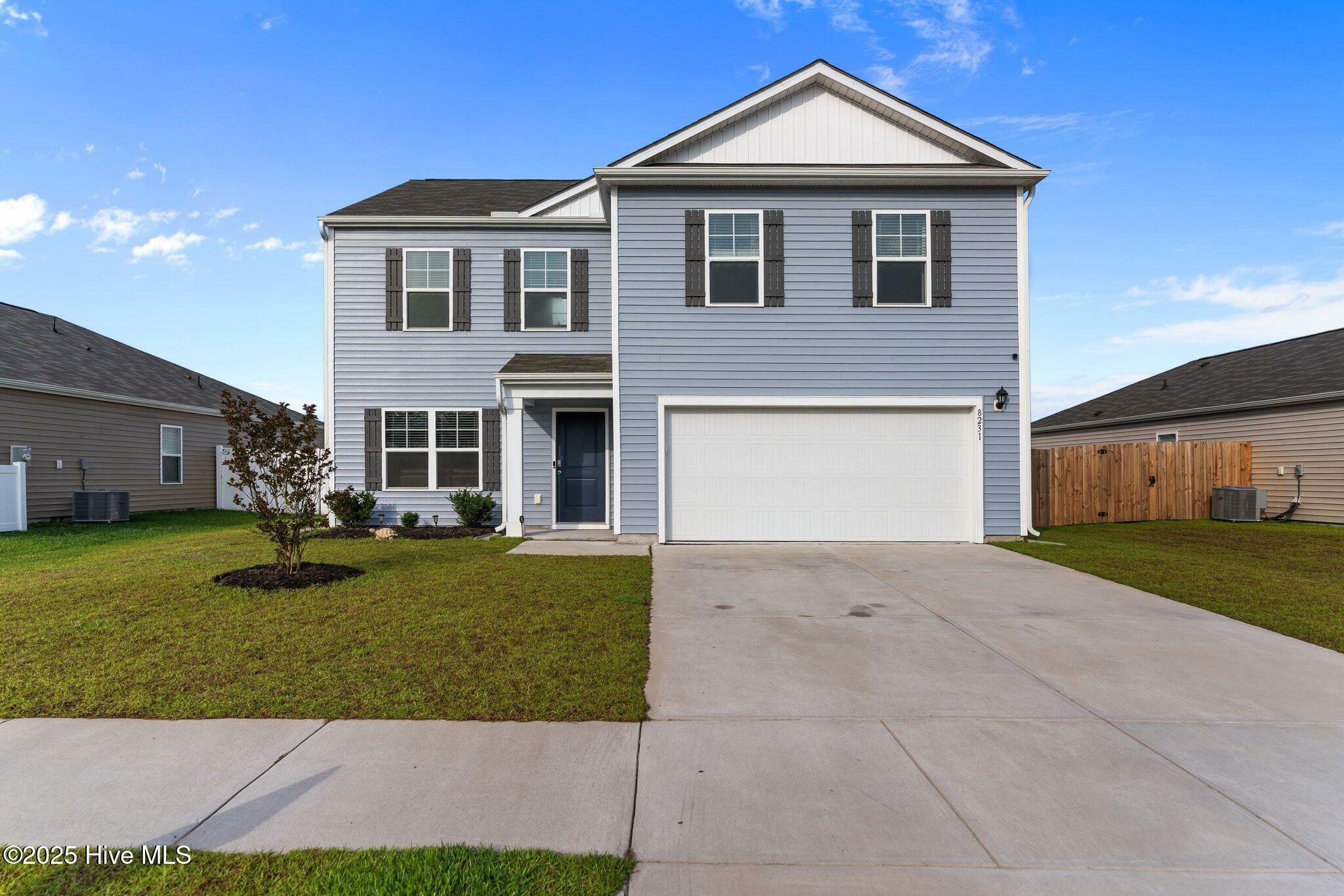 Property Photo: 8231 E Highcroft Drive NE NC 28451