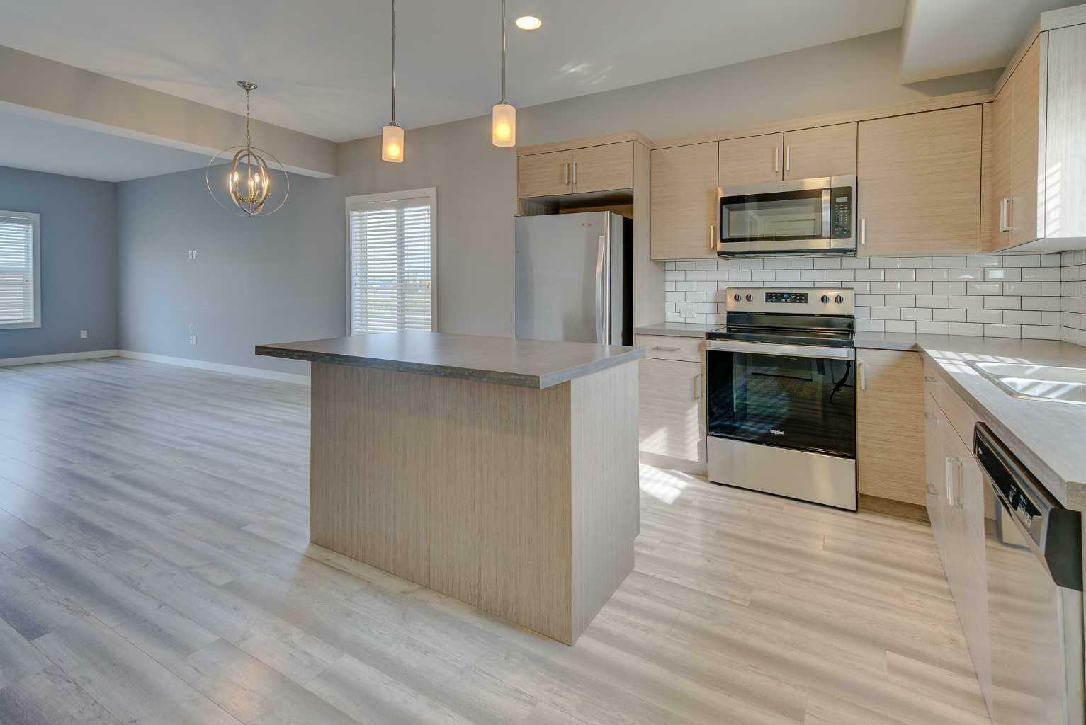 Property Photo: 1 Iron Gate Boulevard AB T4S 0T6