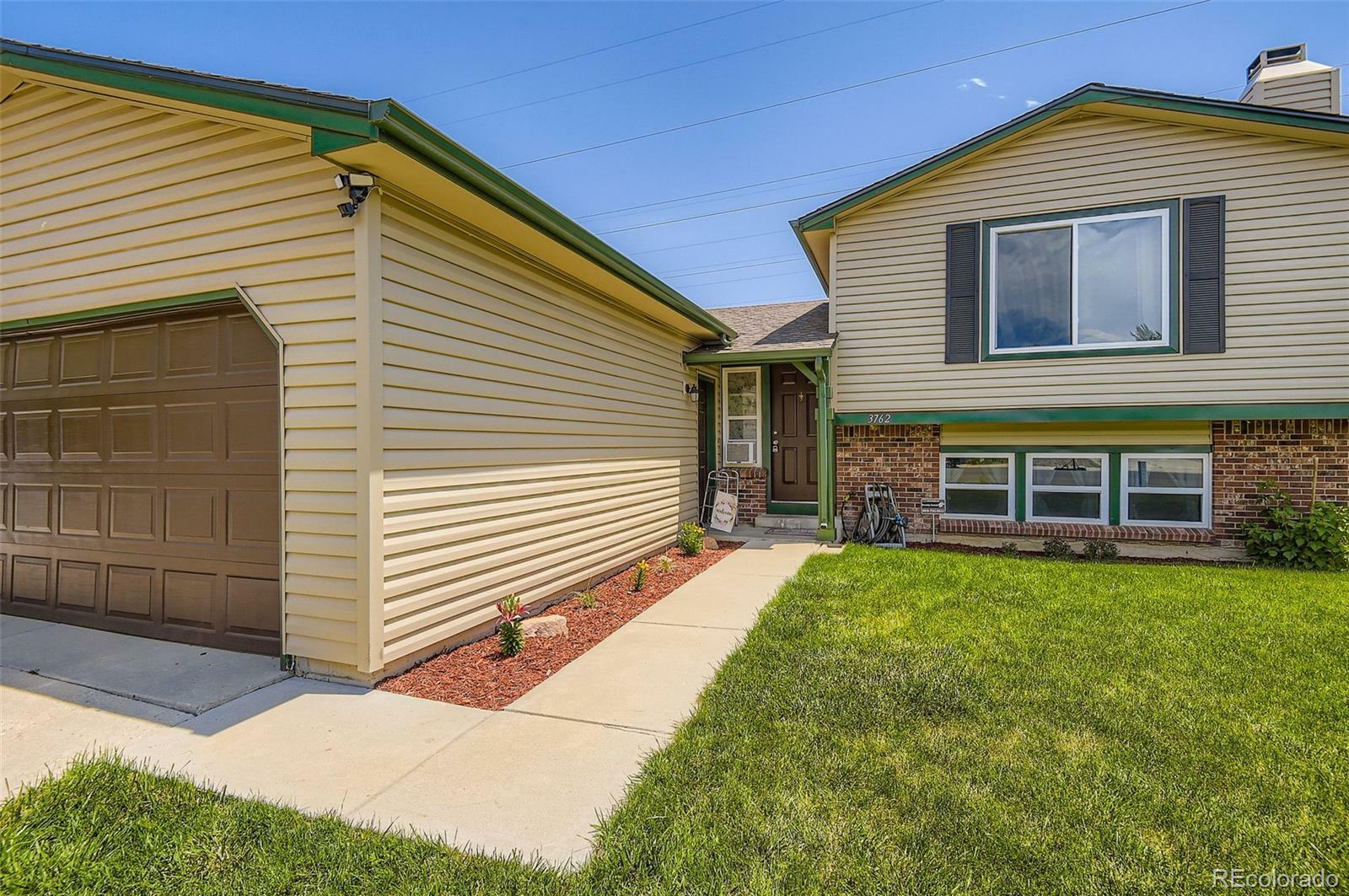 Property Photo: 3762 S Halifax Street CO 80013