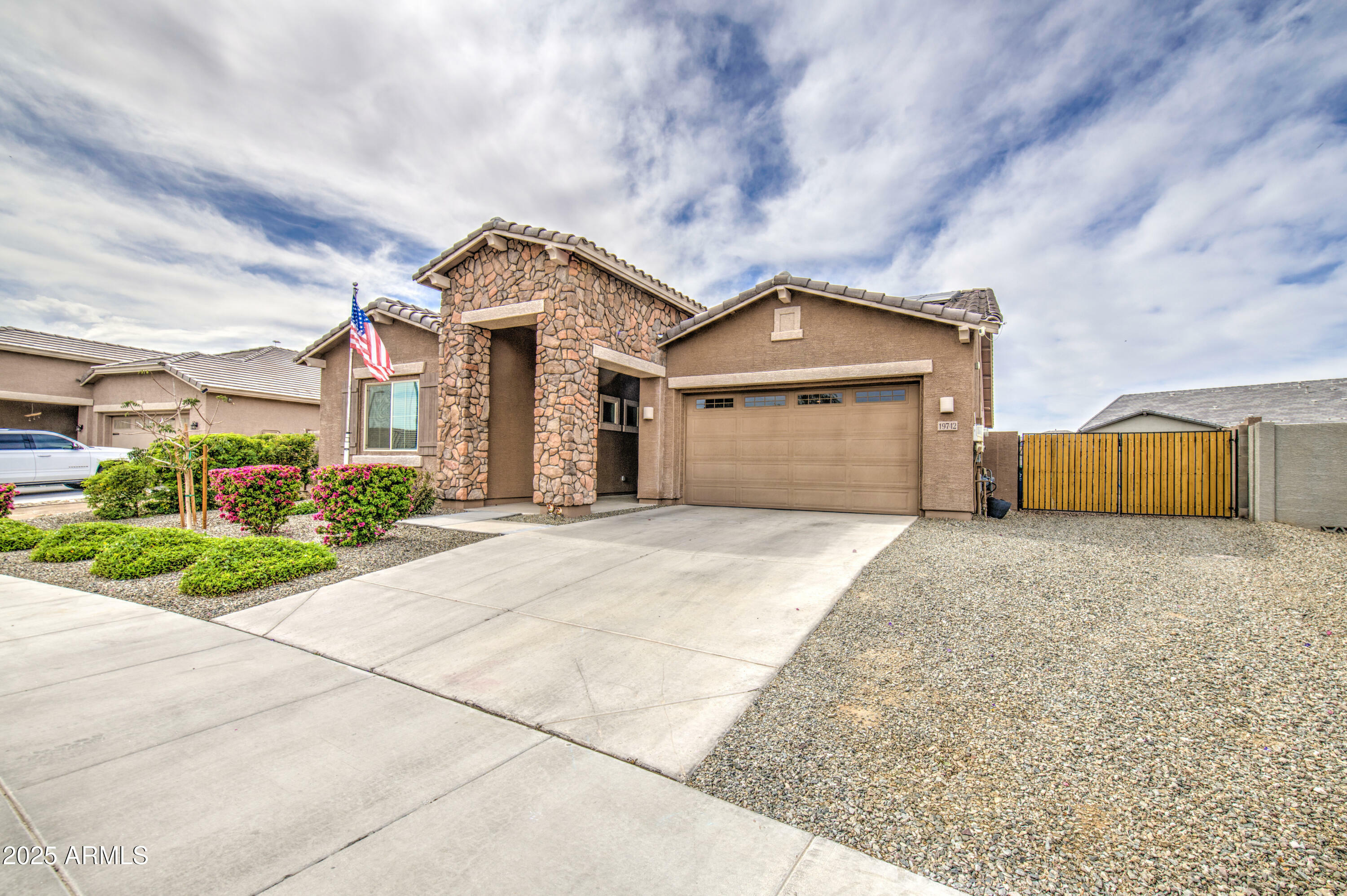 Property Photo: 19742 W Harrison Street AZ 85326
