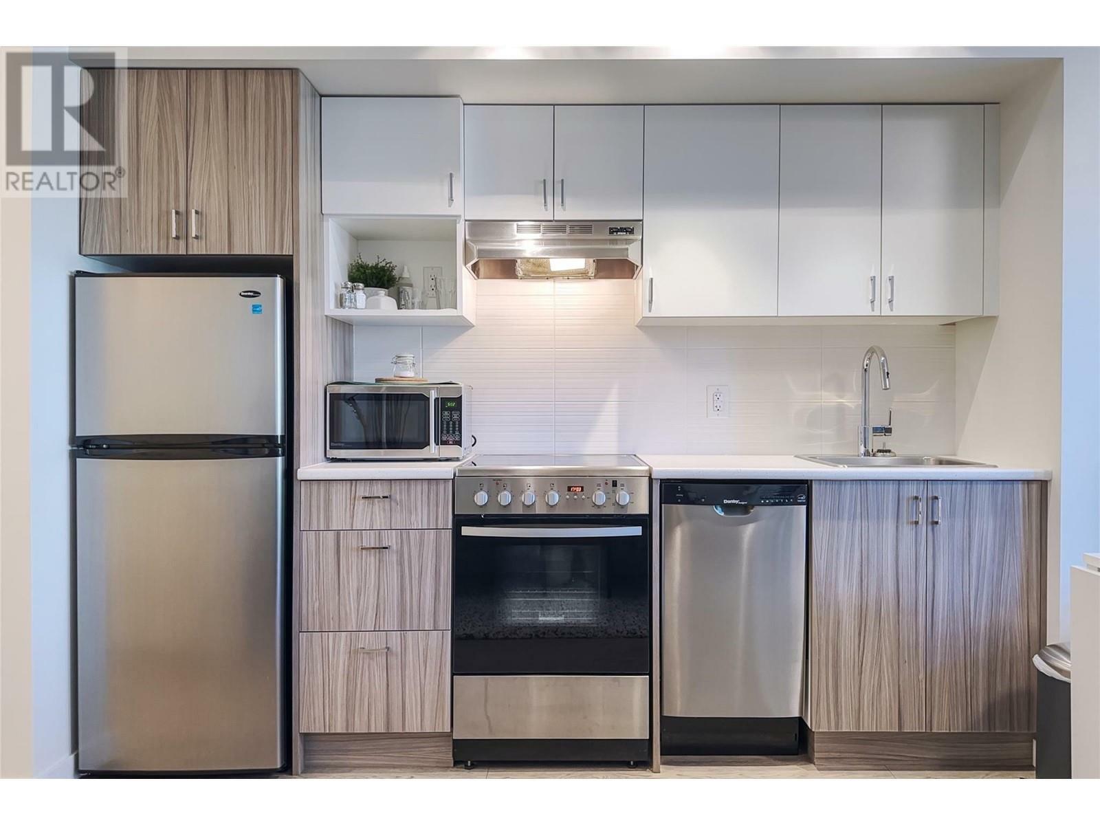 Property Photo: 725 Academy Way 220 BC V1B 0B4