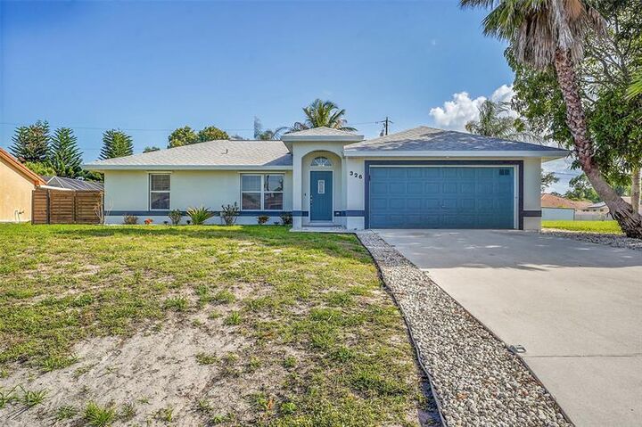 Property Photo: 326 SW Covington Rd FL 34953