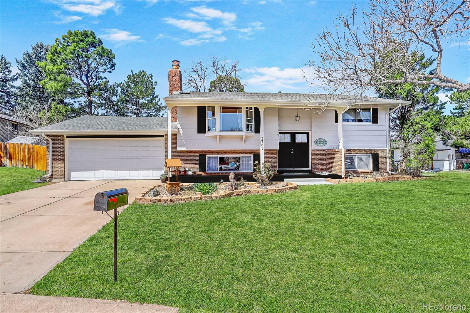 Property Photo: 3785 S Benton Way CO 80235