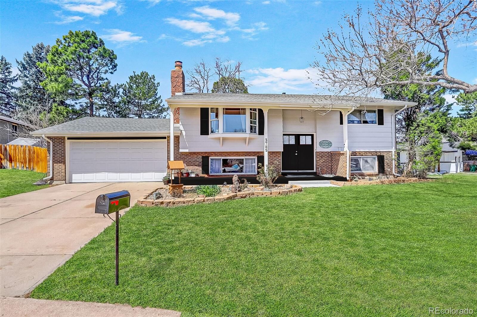 Property Photo: 3785 S Benton Way CO 80235