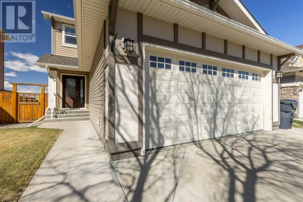 Property Photo: 679 Marie Van Haarlem Crescent North AB T1H 6Y9