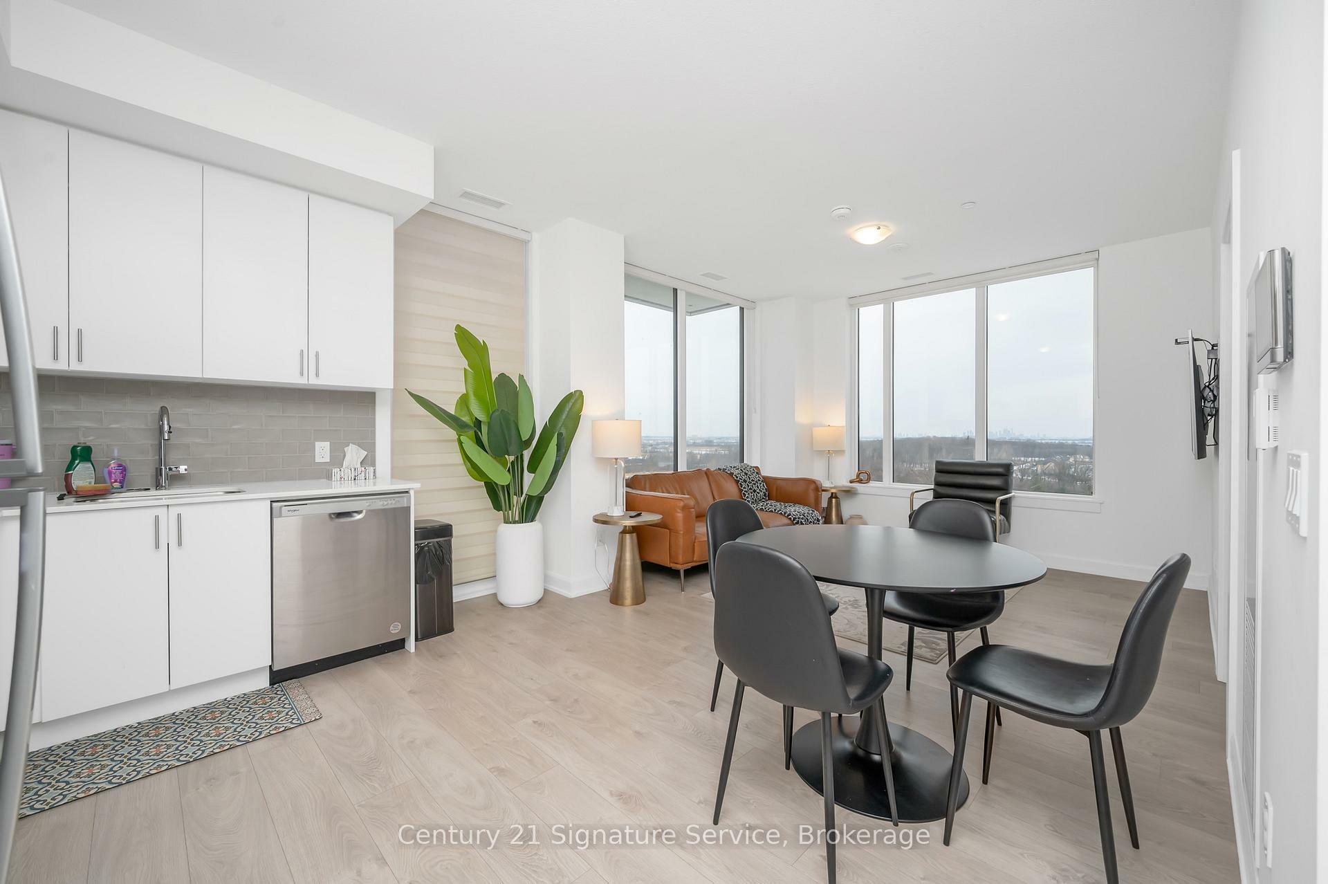 Property Photo: 3220 William Coltson Avenue 1215 ON L6H 7X9