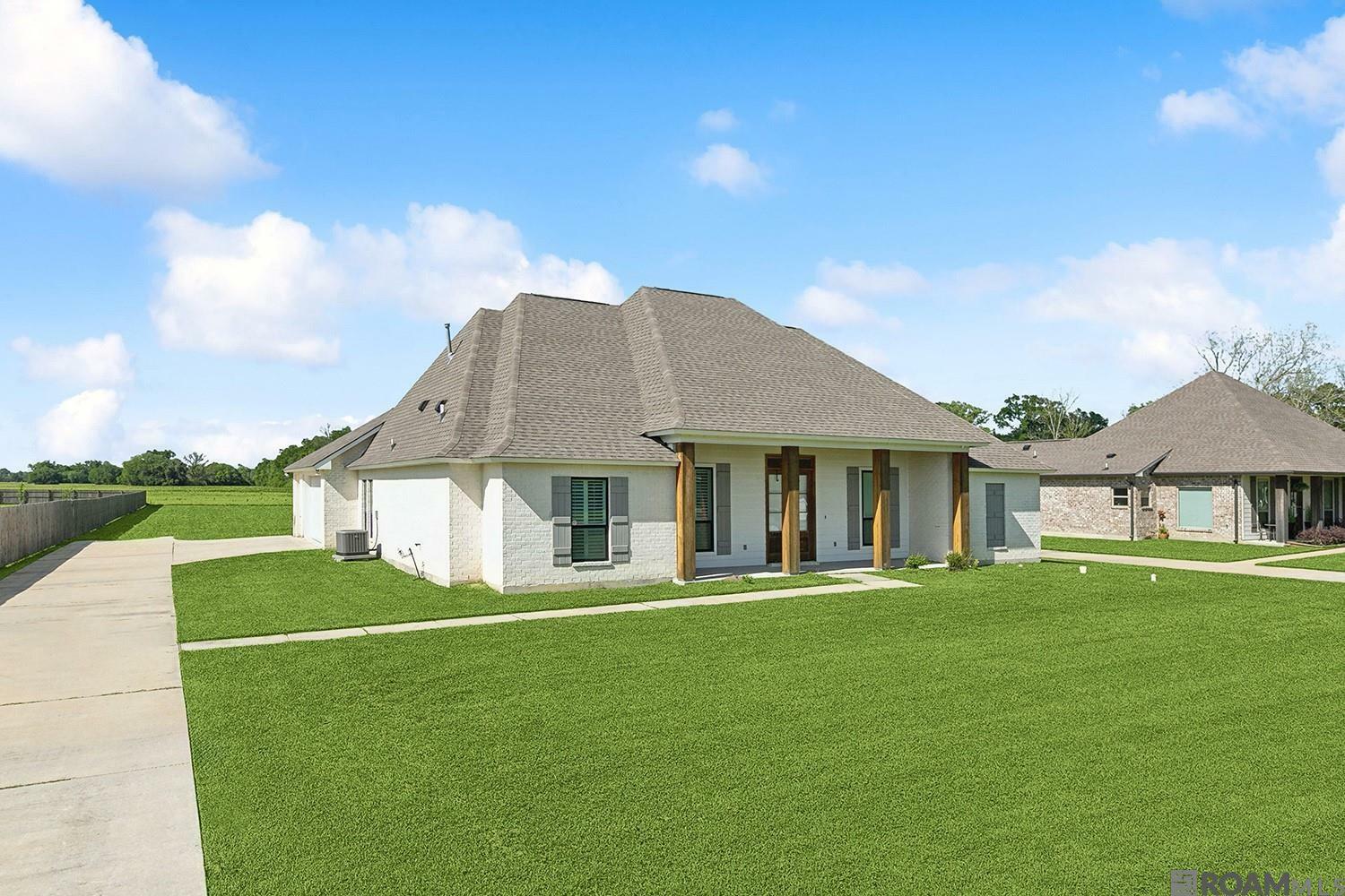 Property Photo: 38052 N Robert Wilson Rd LA 70737