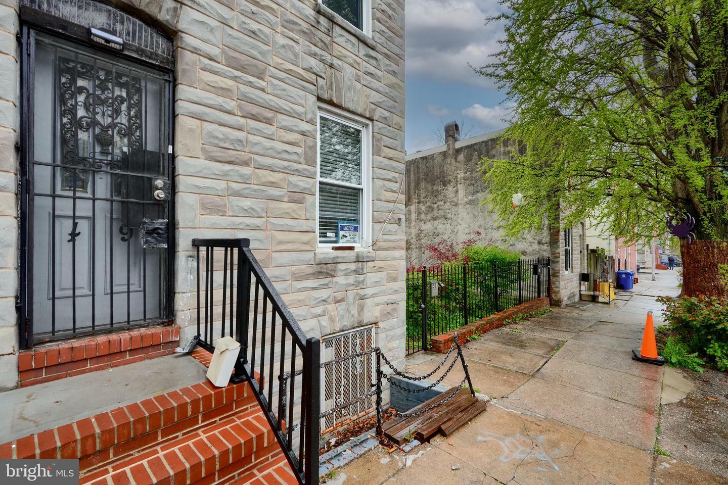 Property Photo: 49 S Carrollton Avenue MD 21223