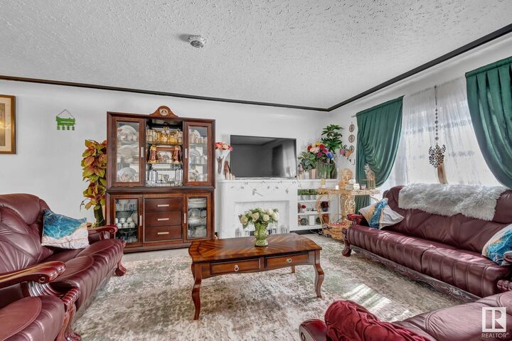 Property Photo:  11306 109A Avenue NW  AB T5H 1G8 
