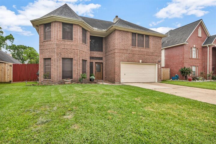 Property Photo:  1003 Highland Woods Drive  TX 77562 