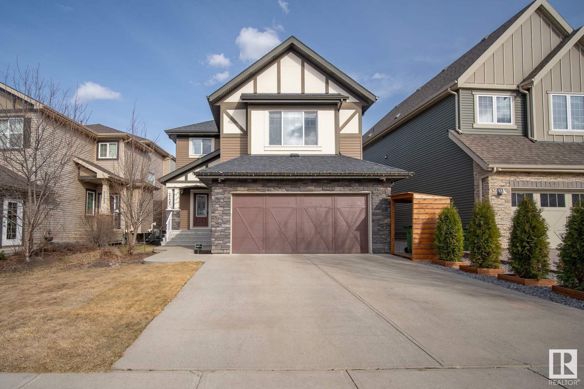 Property Photo: 2135 Glenridding Way SW AB T6W 2H4