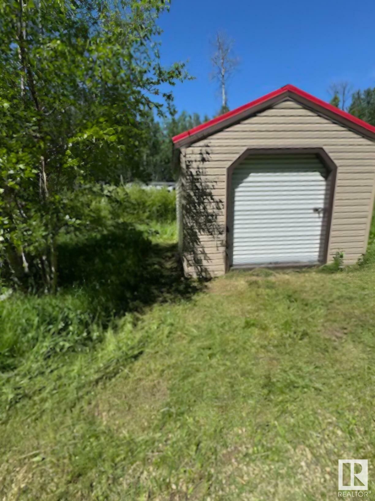 Property Photo:  29 Village West  AB T0C 2V0 