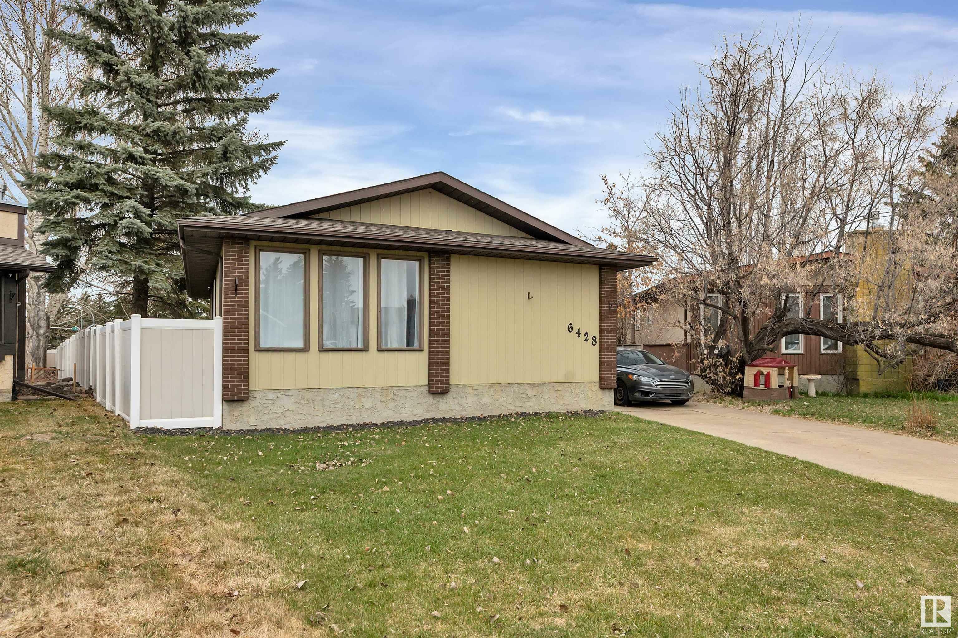 Property Photo: 6428 15 Avenue NW AB T6L 1S6