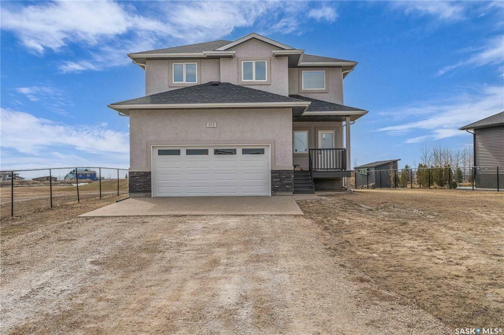 Property Photo: 372 Emerald Park Road SK S4L 0E7