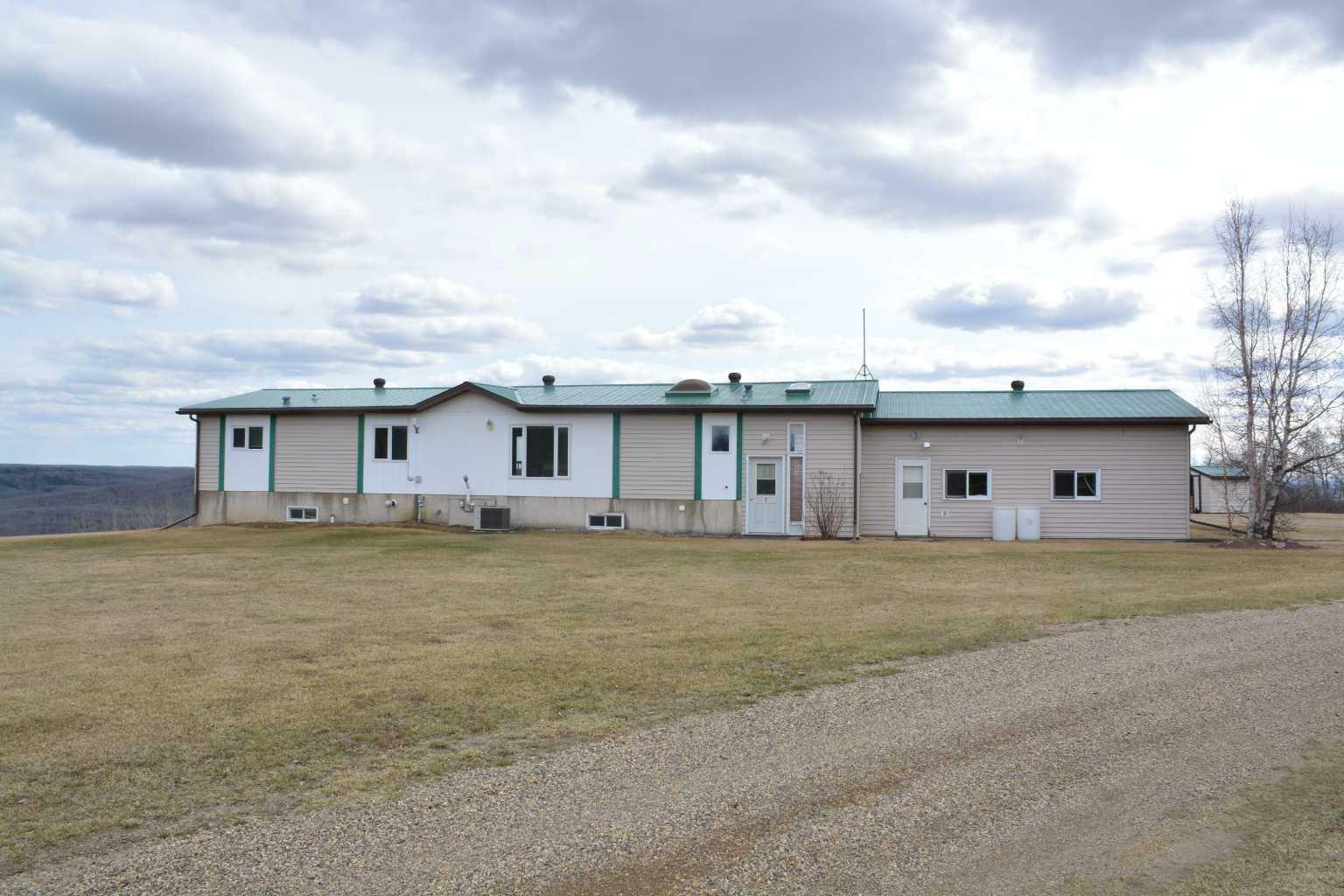Property Photo: 212045 Twp Rd 852 AB T8S 1S4