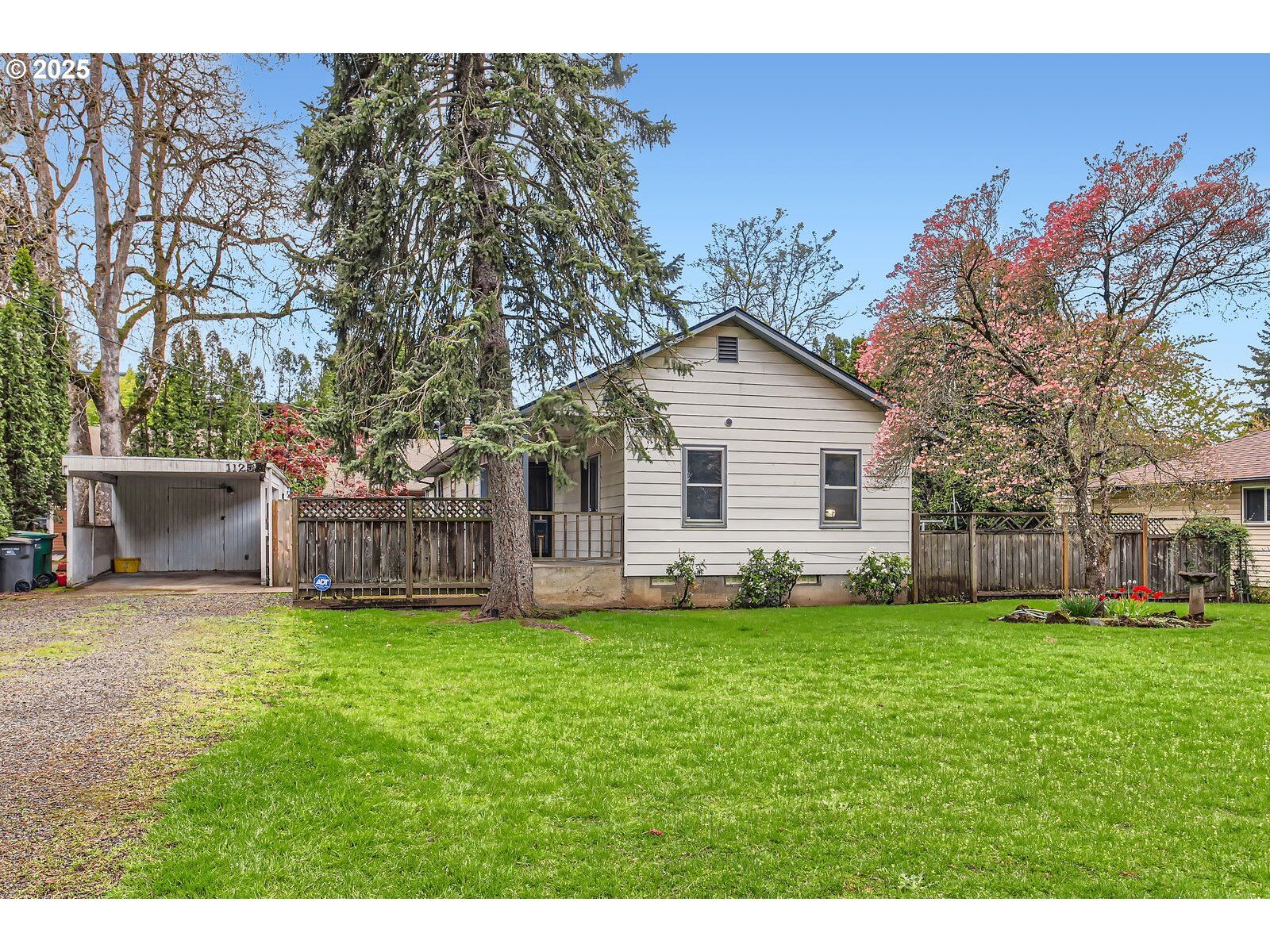 Property Photo:  1125 SE 135th Ave  OR 97233 