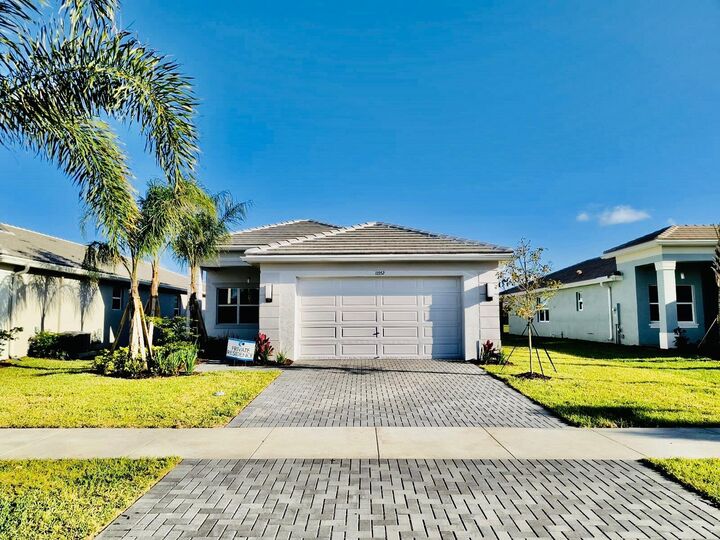 Property Photo: 13352 SW River Rock Road FL 34987