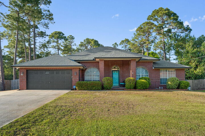 Property Photo: 7044 Sawfish Street FL 32566