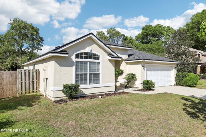 Property Photo:  86123 Red Holly Place  FL 32097