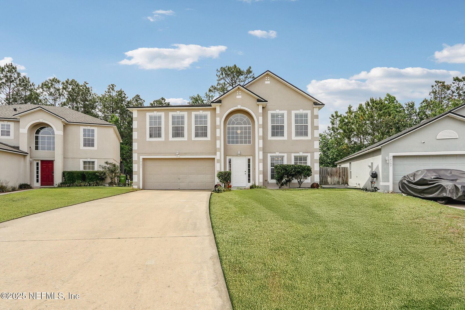 Property Photo:  76391 Long Leaf Loop  FL 32097 