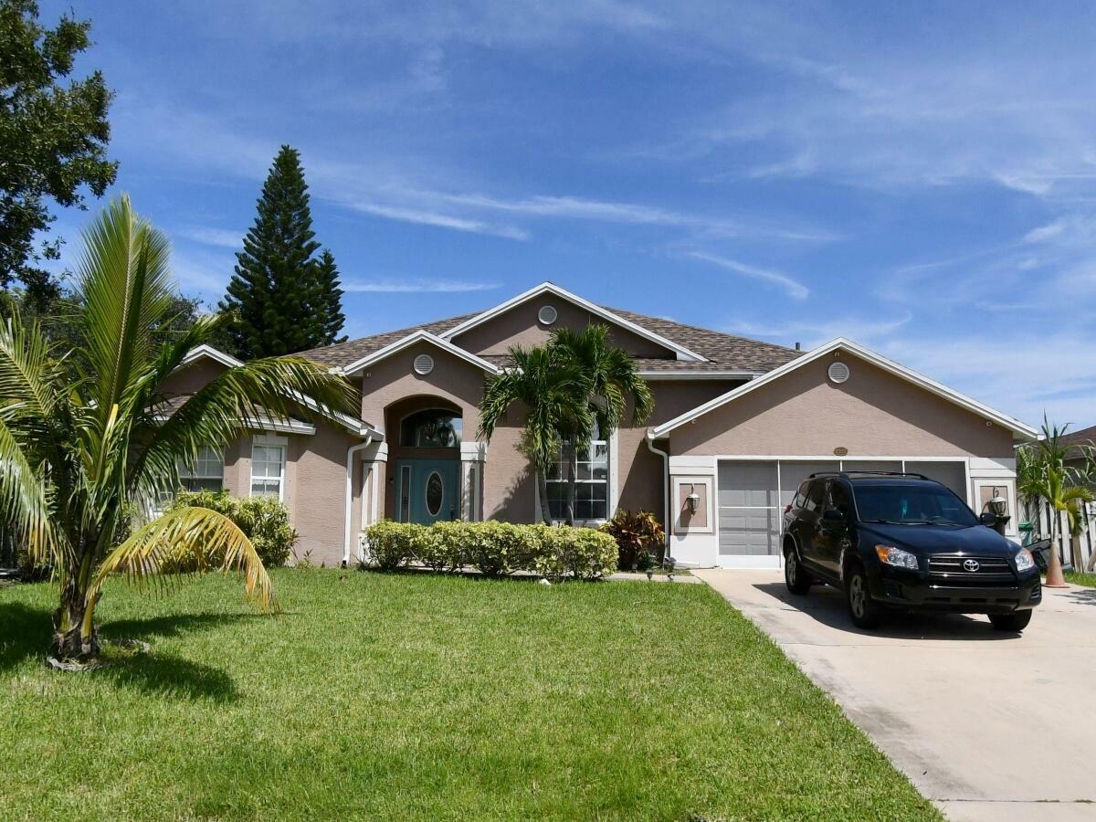 Property Photo: 1937 SW Davis Street FL 34953