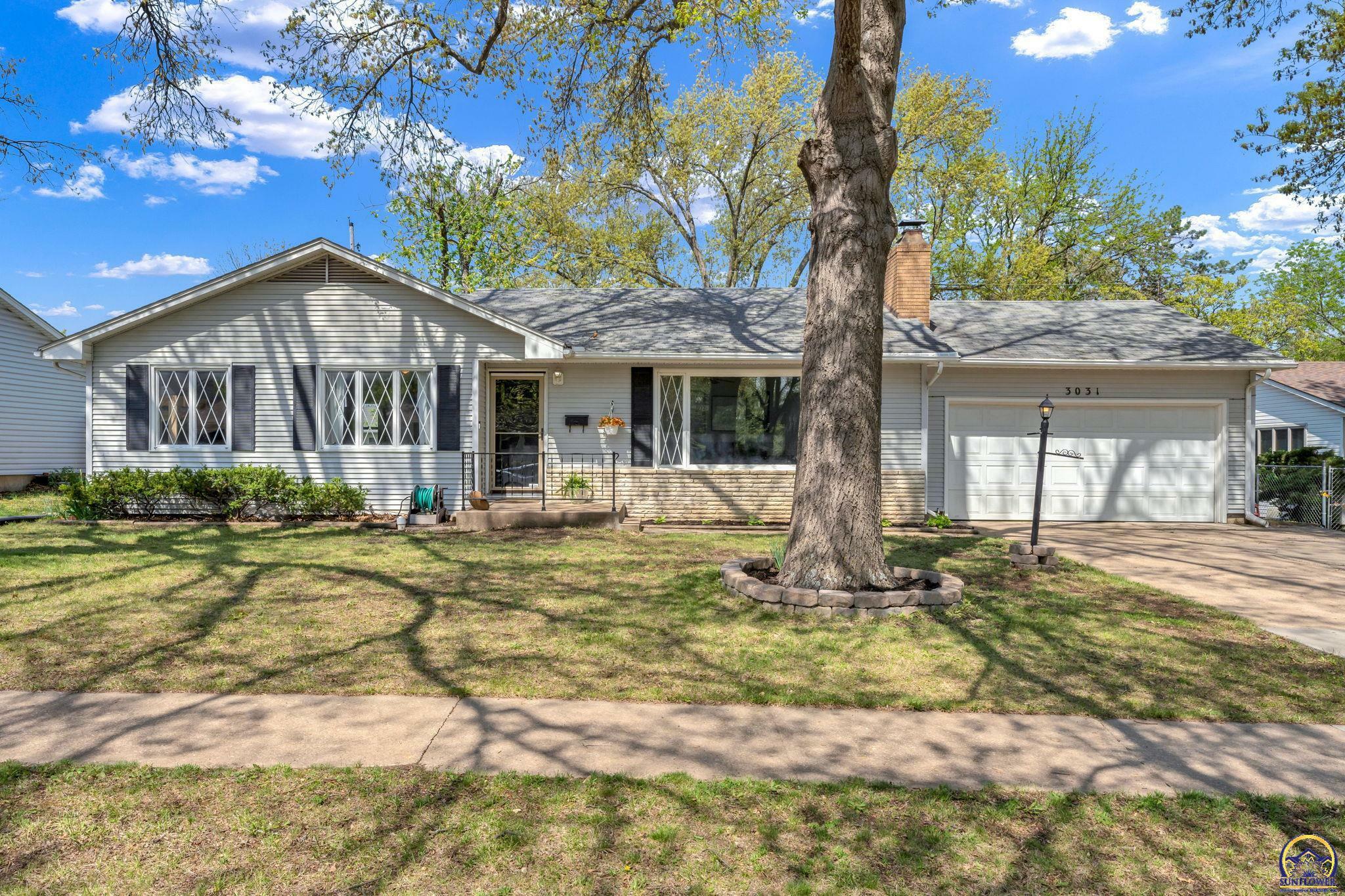 Property Photo:  3031 SW College Ave  KS 66611 
