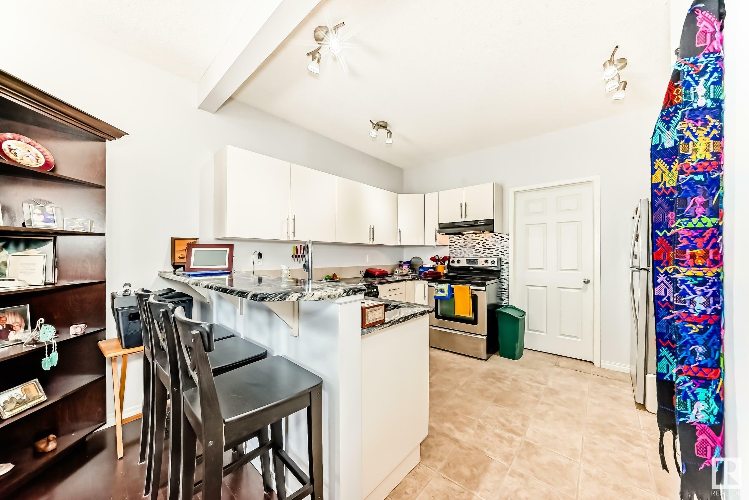 Property Photo: 30 Oak Vista Drive 14 AB T8N 3T1