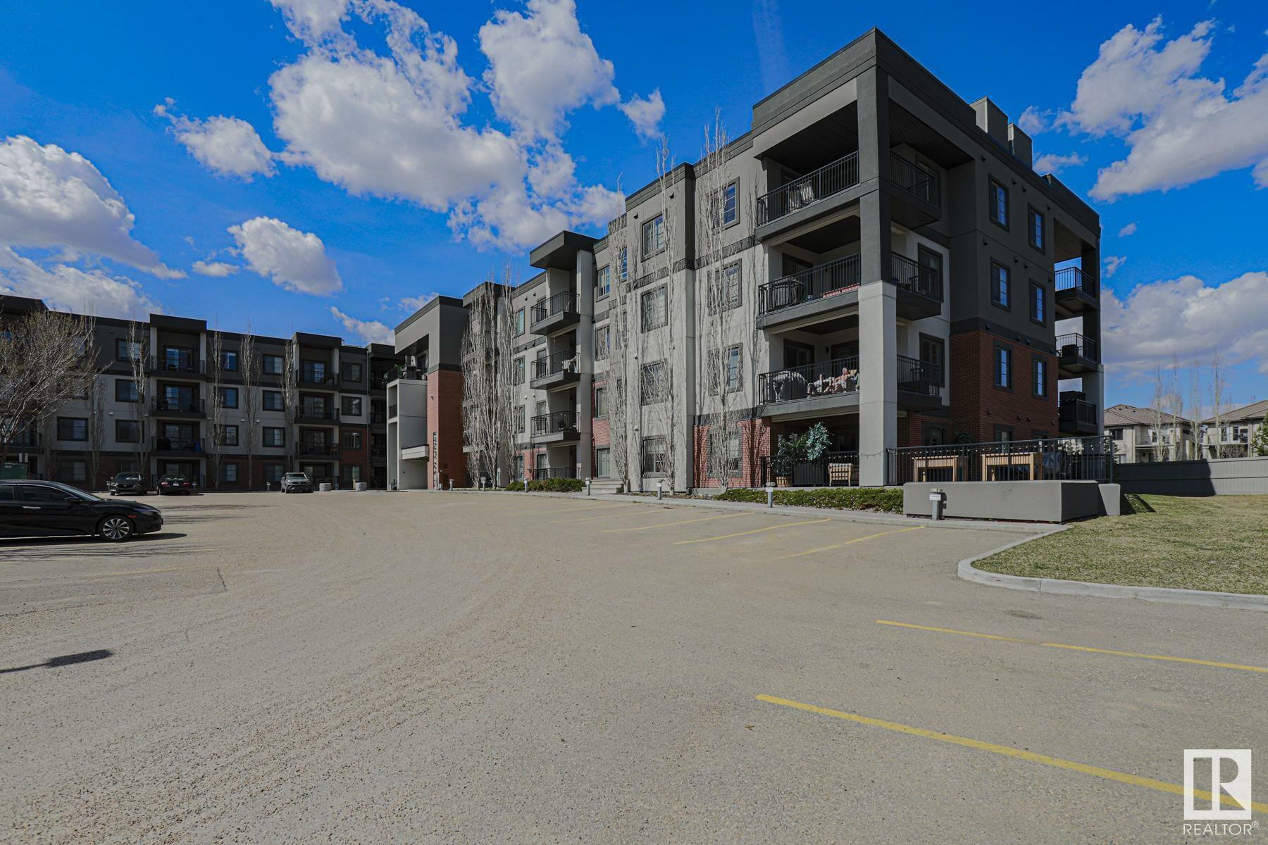 Property Photo: 1144 Adamson Drive SW 317 AB T6W 2X7