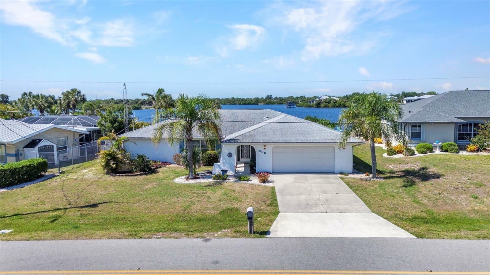 Property Photo: 318 Spring Lake Boulevard NW FL 33952