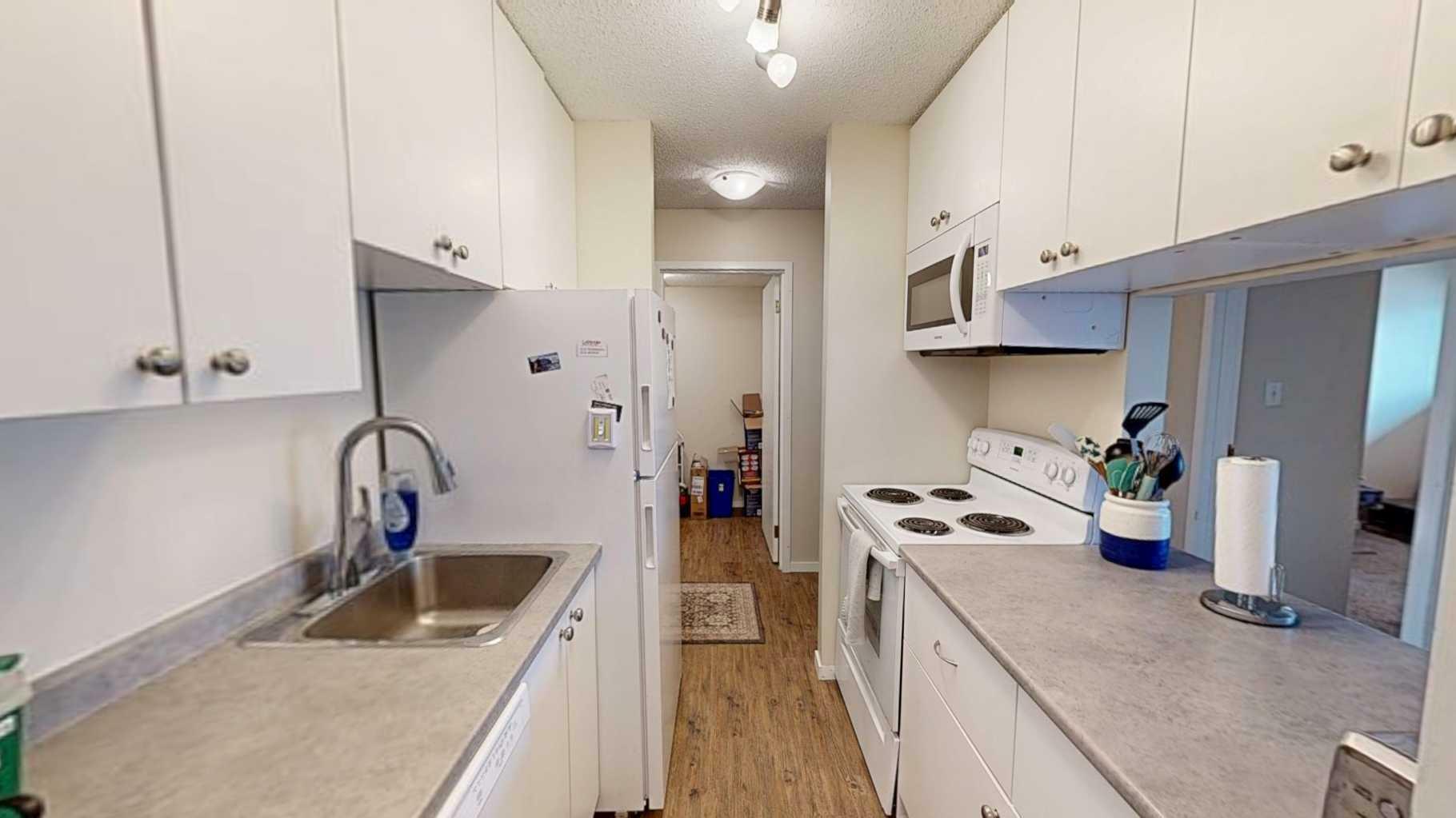 Property Photo: 405 Columbia Boulevard W 102 AB T1K 5R8