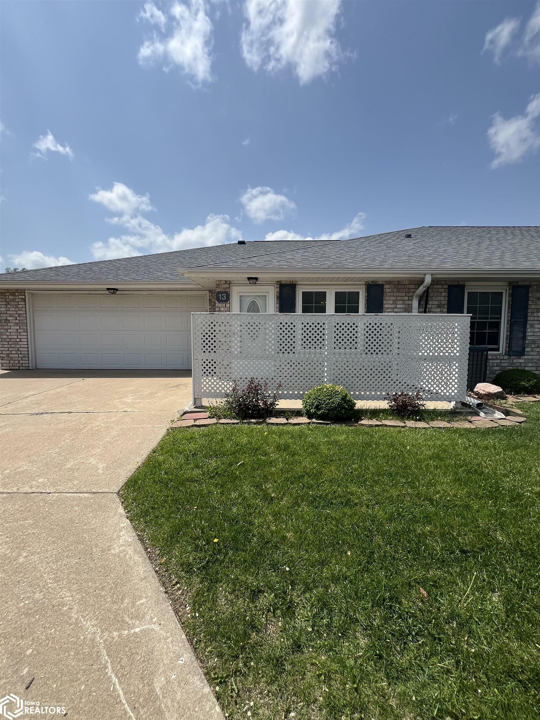 Property Photo: 1123 48th Street 13 IA 52627