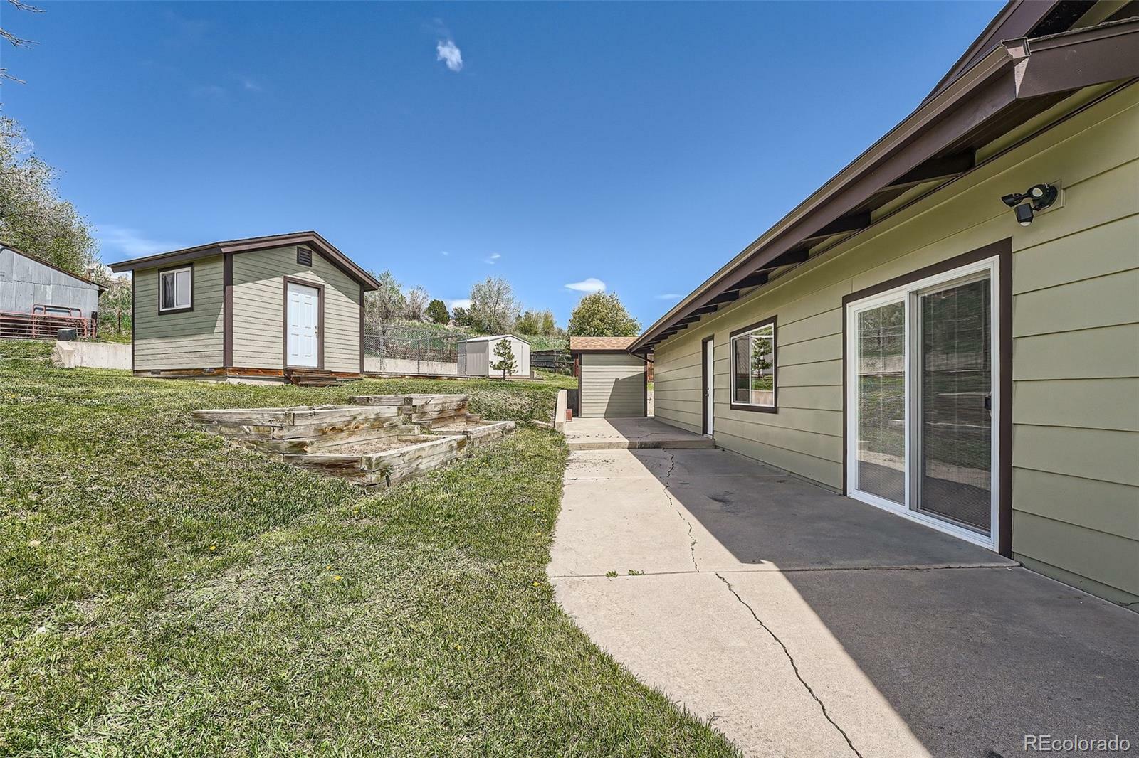 Property Photo: 13805 W 82nd Avenue CO 80005