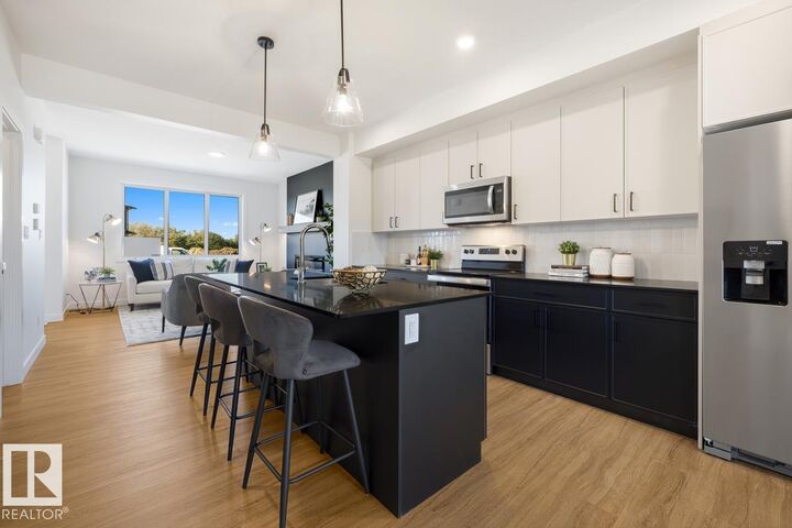 Property Photo:  10241 92A Avenue  AB T8R 1A0 