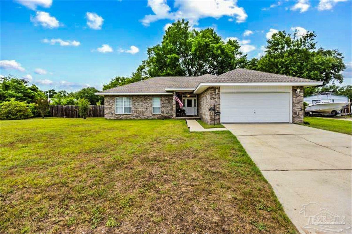 Property Photo: 5761 Twisted Oak Ct FL 32571