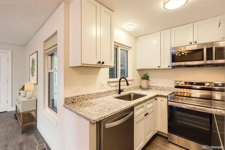 Property Photo:  909 S Dawson Way 2  CO 80012 