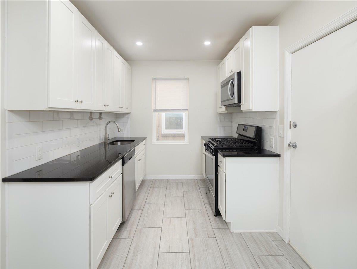 Property Photo: 59-23 69th Lane NY 11378