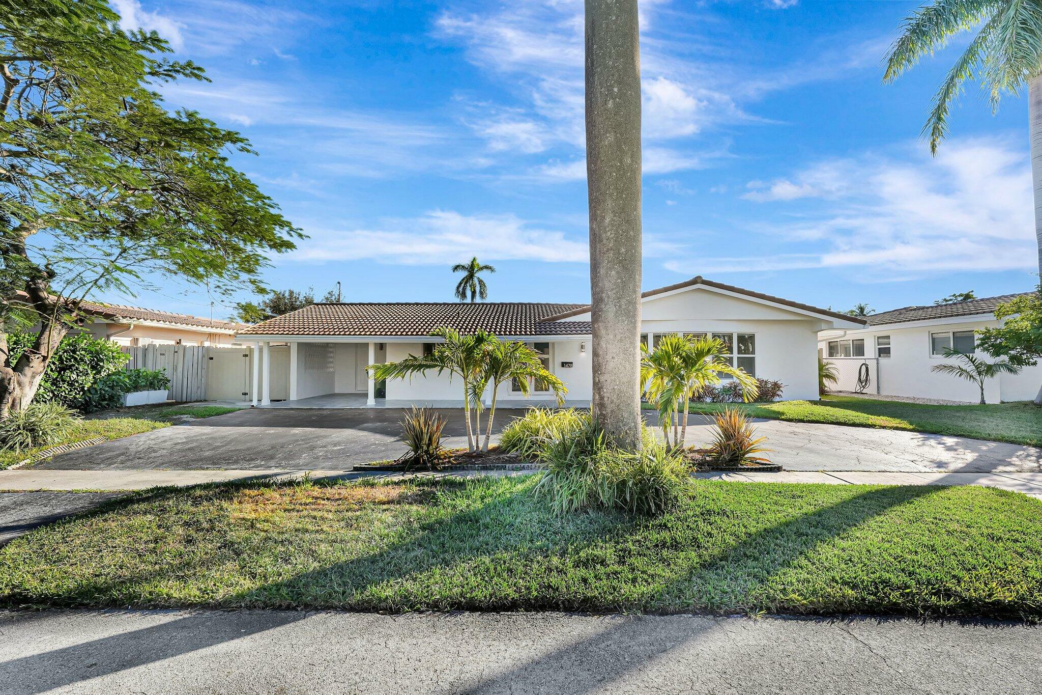 Property Photo: 1478 NE 57th Court FL 33334