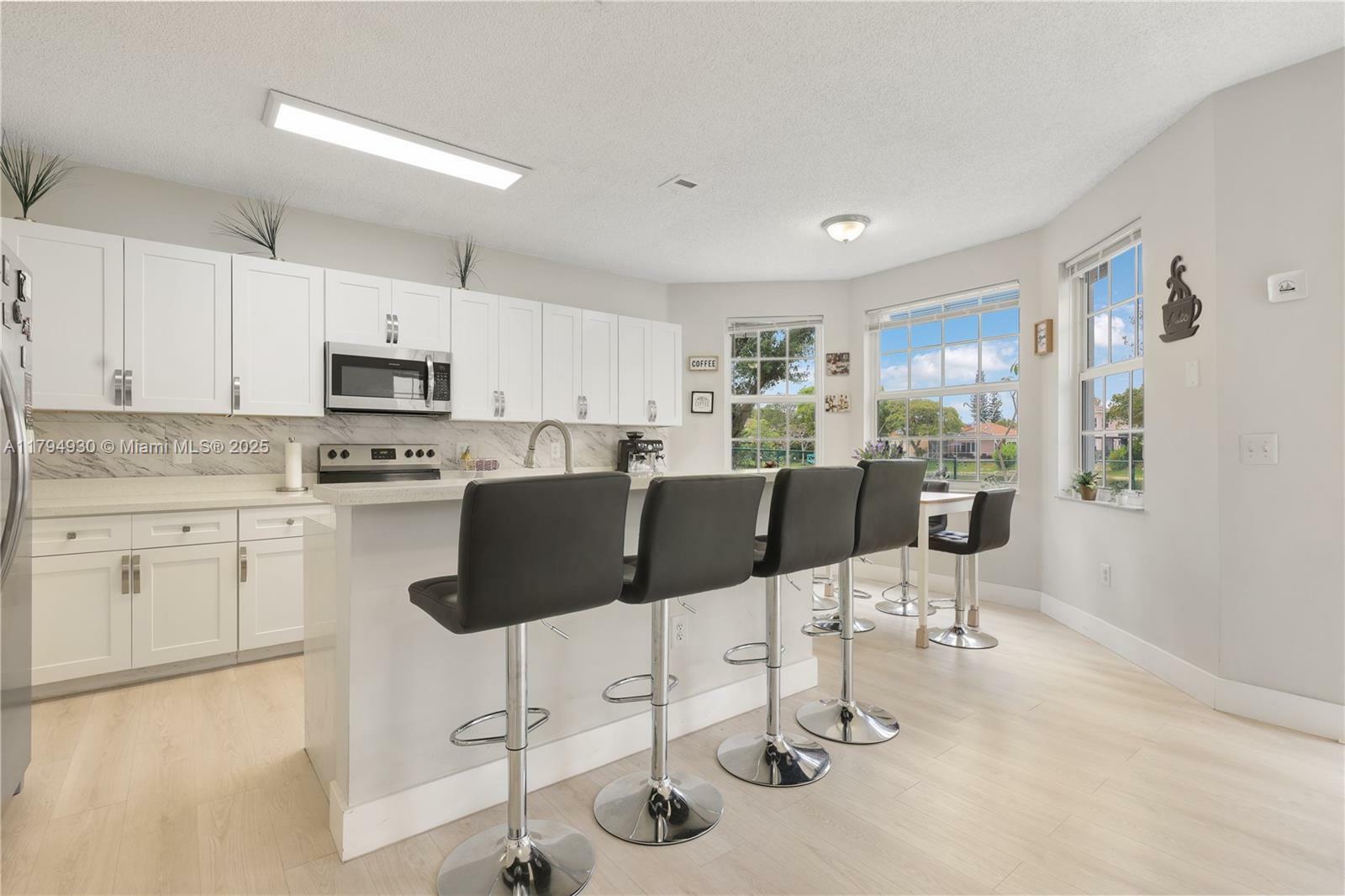 Property Photo: 150 NW 151st Ave FL 33028