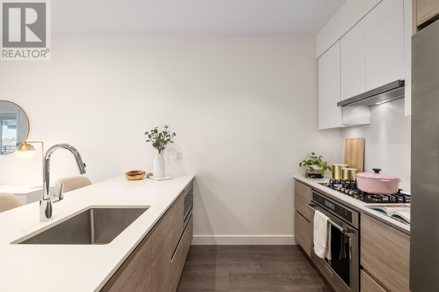 Property Photo: 4468 Dawson Street 212 BC V5C 0J9