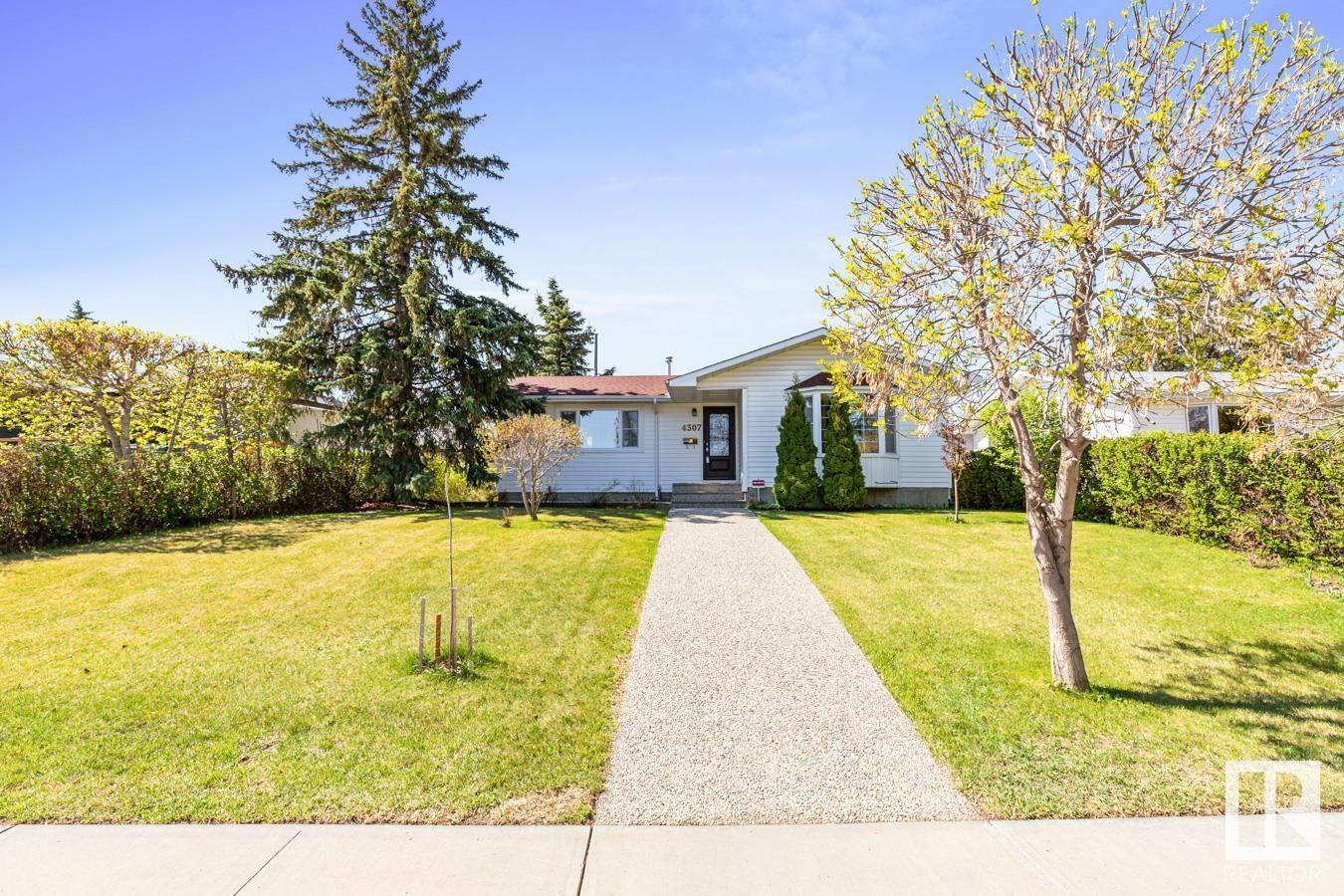 Property Photo: 4307 109A Avenue NW AB T6A 1S3