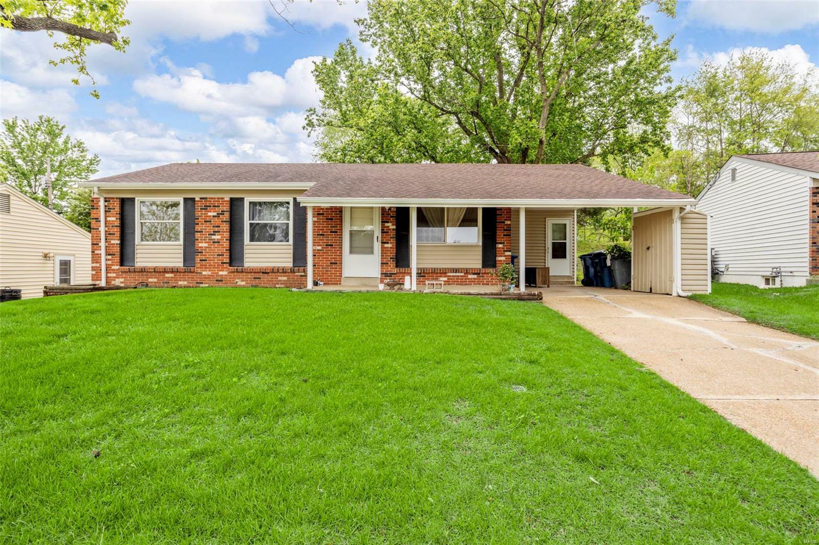 Property Photo: 12007 Charleston Drive MO 63043