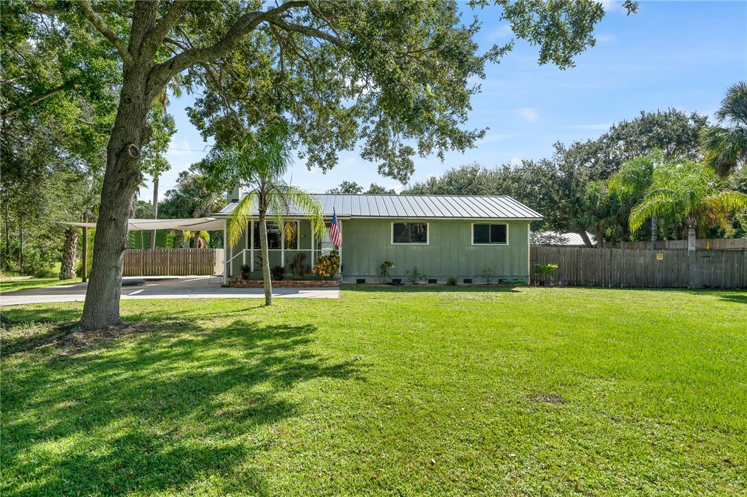 Property Photo: 9633 Honeysuckle Drive FL 32976