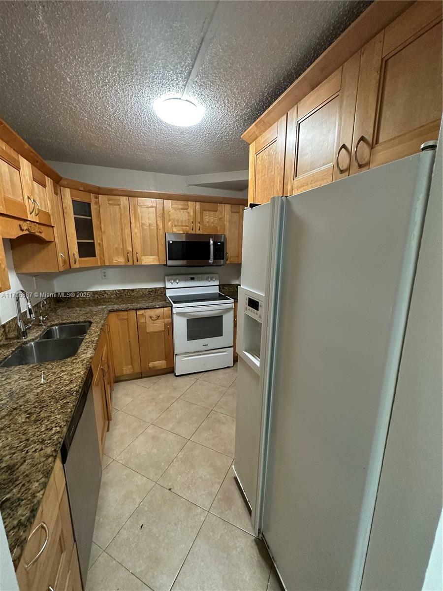 Property Photo: 4394 NW 9th Ave 21-3C FL 33064