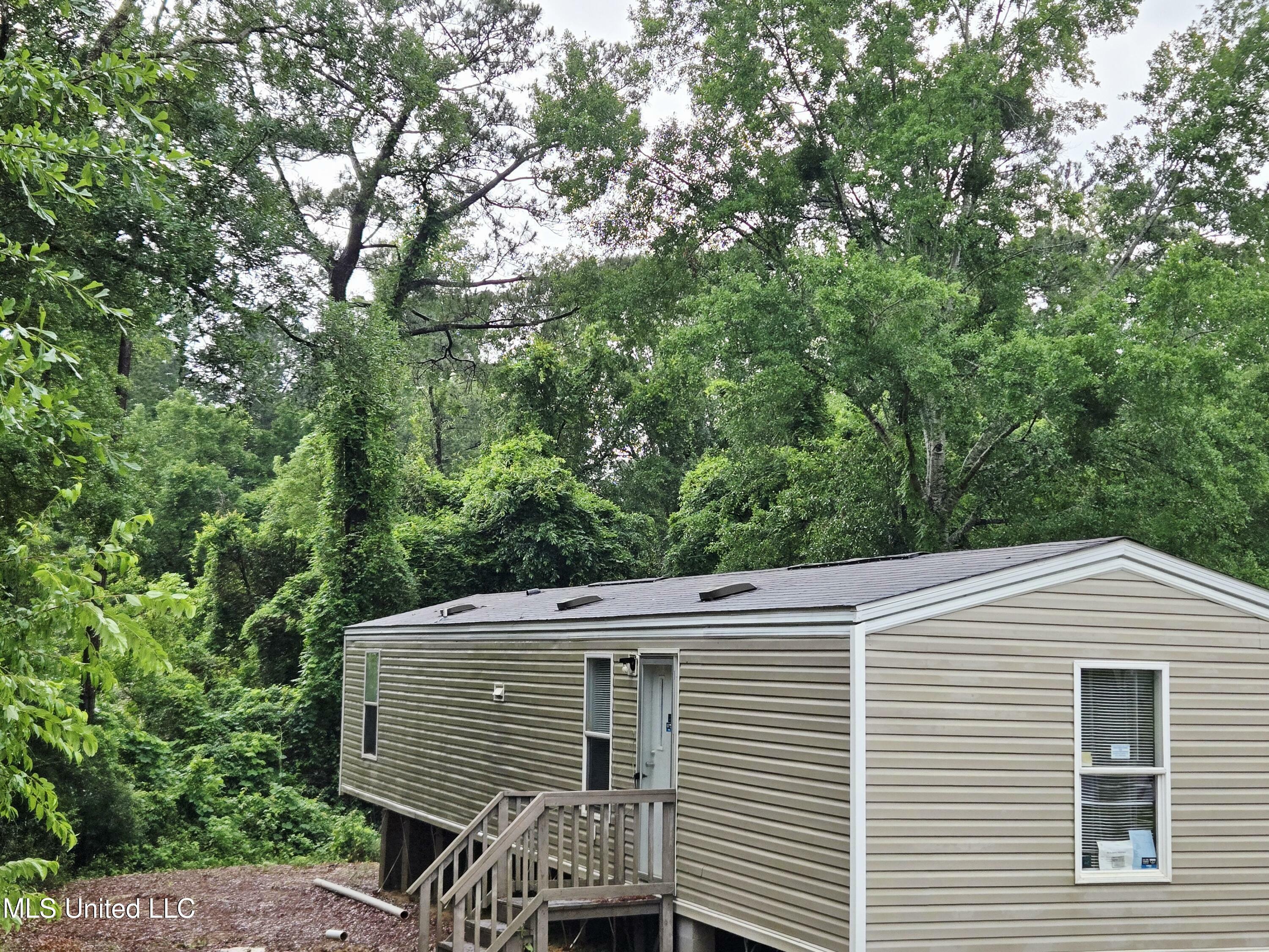 Property Photo: 10620 Limu Way MS 39525