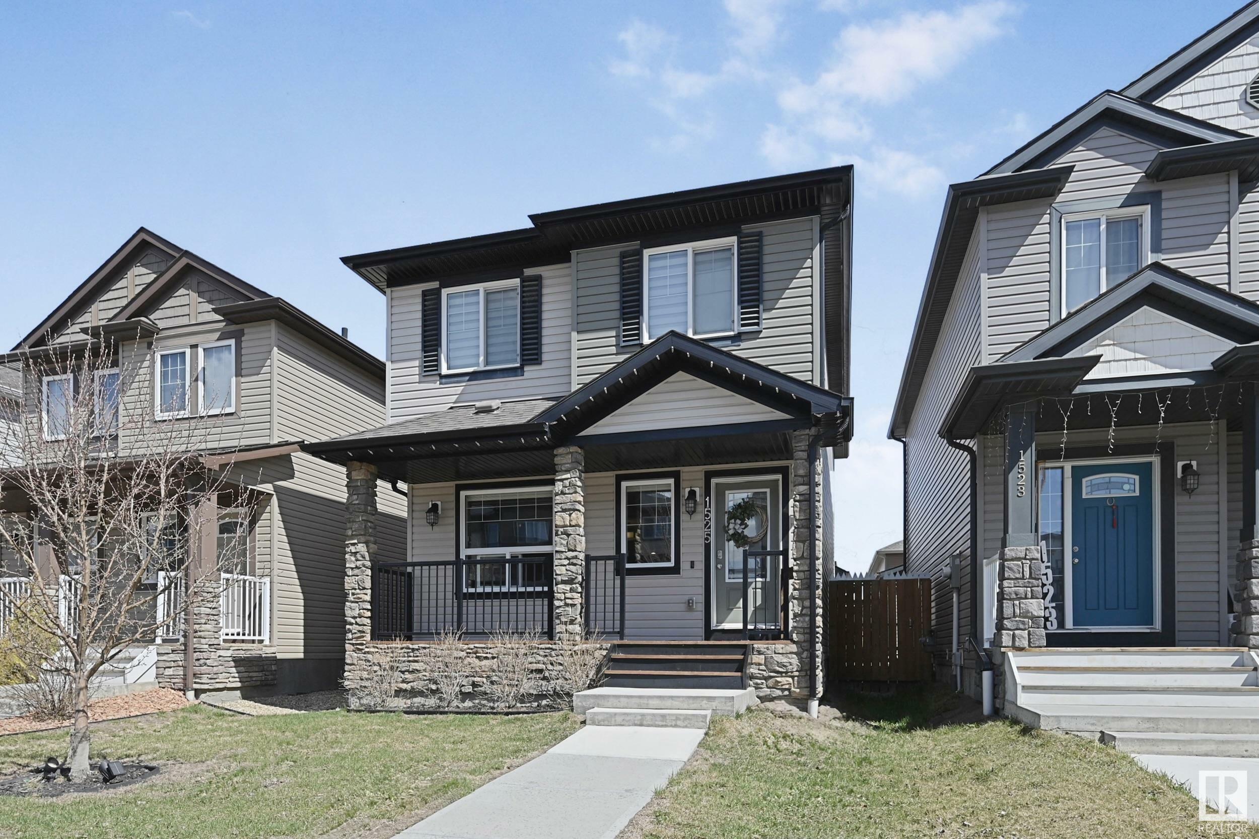 Property Photo: 1525 Tamarack Boulevard NW AB T6T 2E3