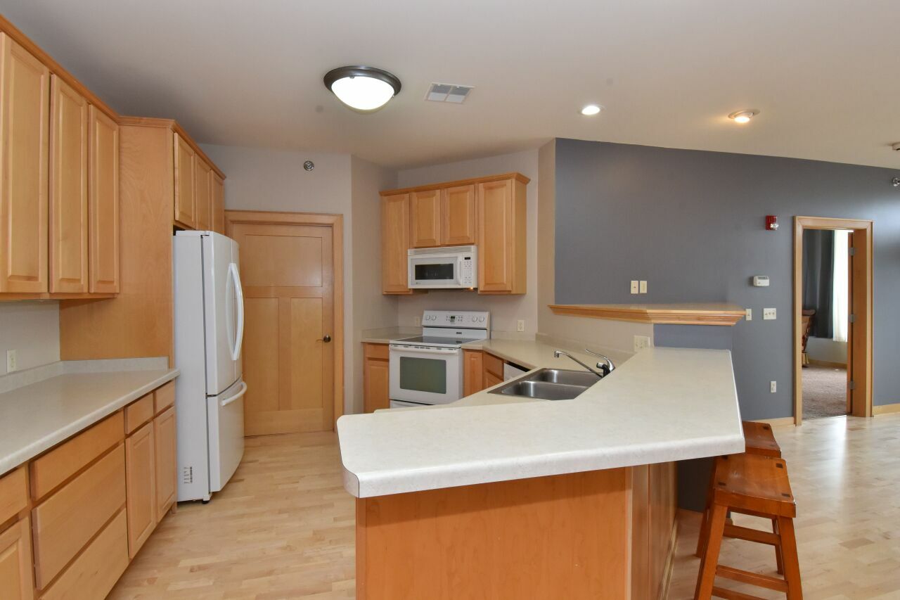Property Photo: 110 S Wisconsin St 2E WI 53074