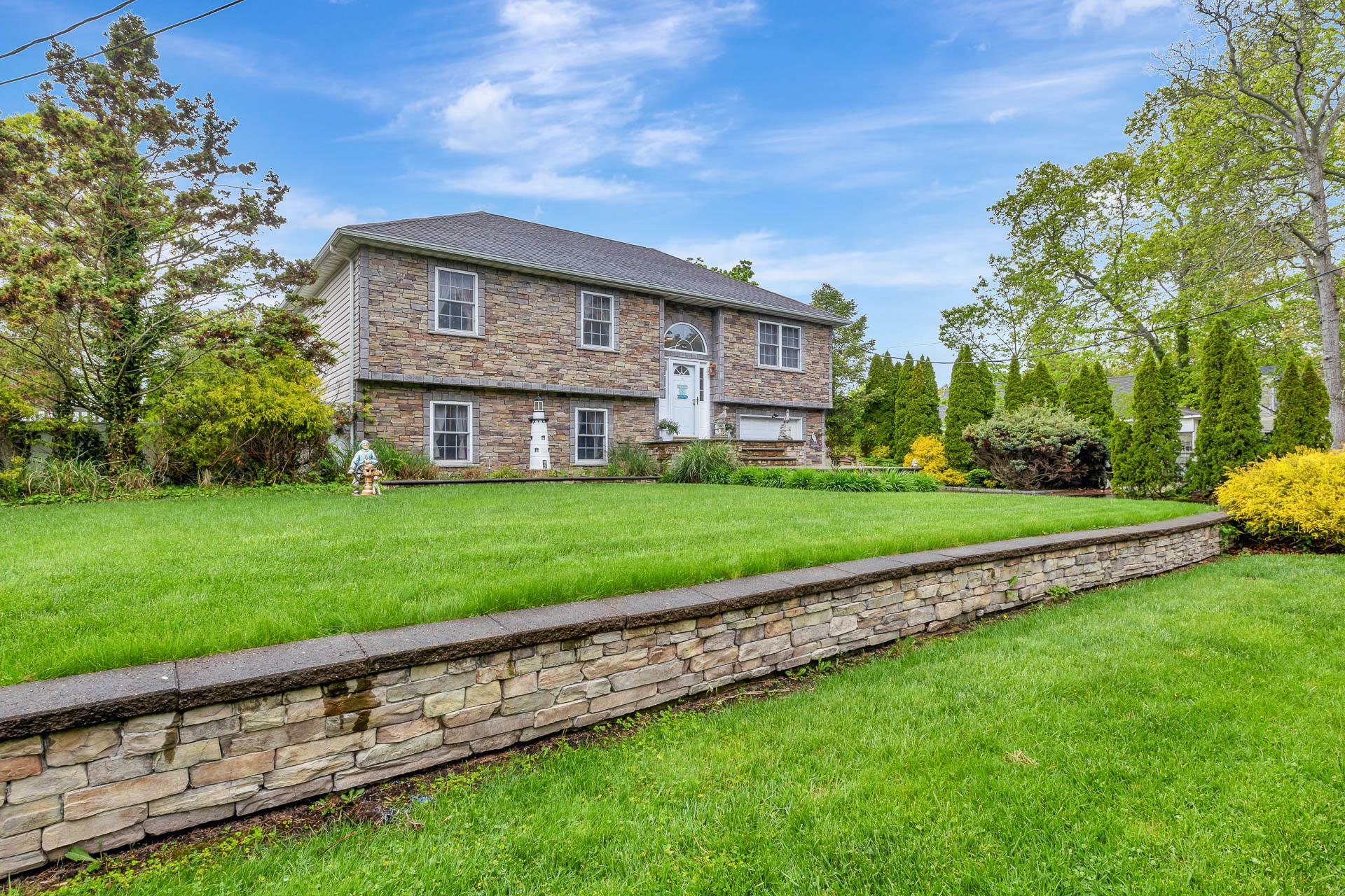 Property Photo: 102 Dahlia Drive NY 11951